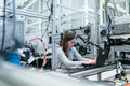 Machine operator near hazard placards